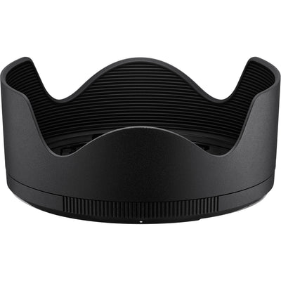 Black camera lens hood on a white background