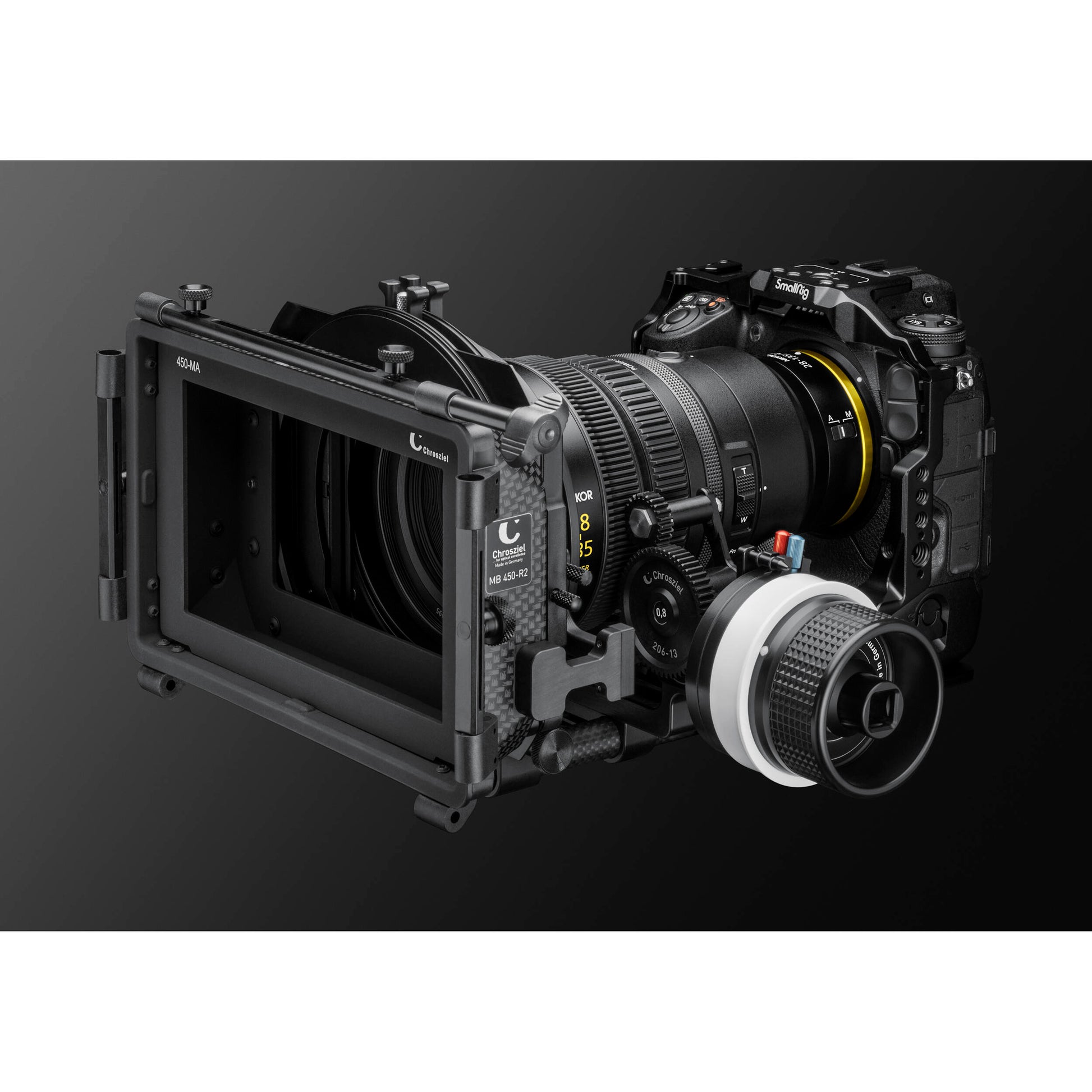 Camera lens and mechanical components on a dark background