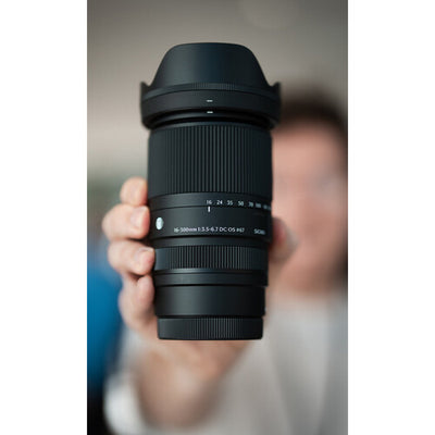 Sigma 16-300mm f/3.5-6.7 DC OS Contemporary mirrorless lens featuring an 18.8x zoom ratio, 24-450mm equivalent focal length, 1:2 macro magnification, high-response linear actuator autofocus, 9 rounded aperture blades, and dust- and splash-resistant construction."