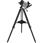 Telescope on a tripod with a white background