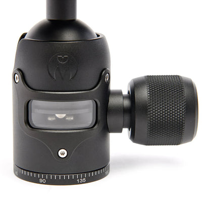 3 Legged Thing AirHed Vu Ball Head in matte black, featuring a magnesium alloy body with a clear vision panel showing the internal mechanism, Arca-type quick release plate, coloured knurled tightening knob, integrated bubble level, and 360° panning capability with independent pan lock.