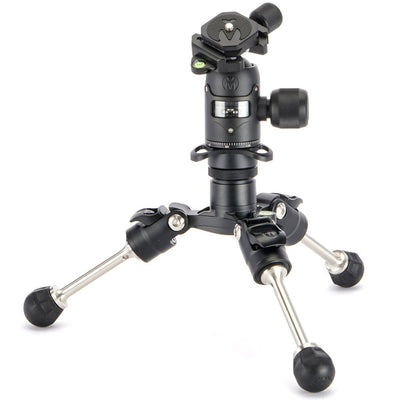 Camera tripod with ball head on a white background