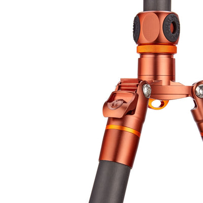 Close-up of an orange and black mechanical component on a white background