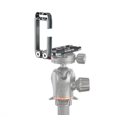 Camera tripod head with quick release plate on a white background