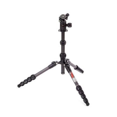 Black camera tripod on a white background