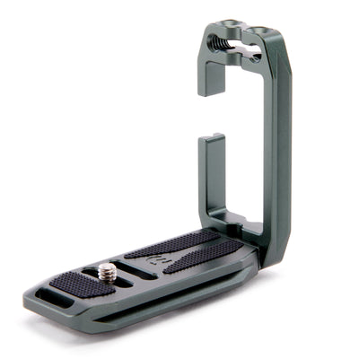 Gray metal camera accessory on a white background