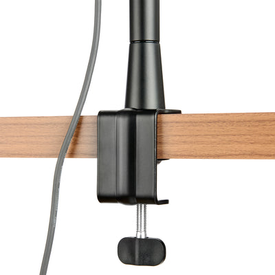 The Microphone Arm is a versatile solution that features height adjustment, built-in cable management, and secure mounting for microphones up to 1 kg.