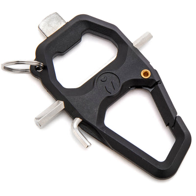 Black multi-tool keychain with bottle opener and other tools on a white background