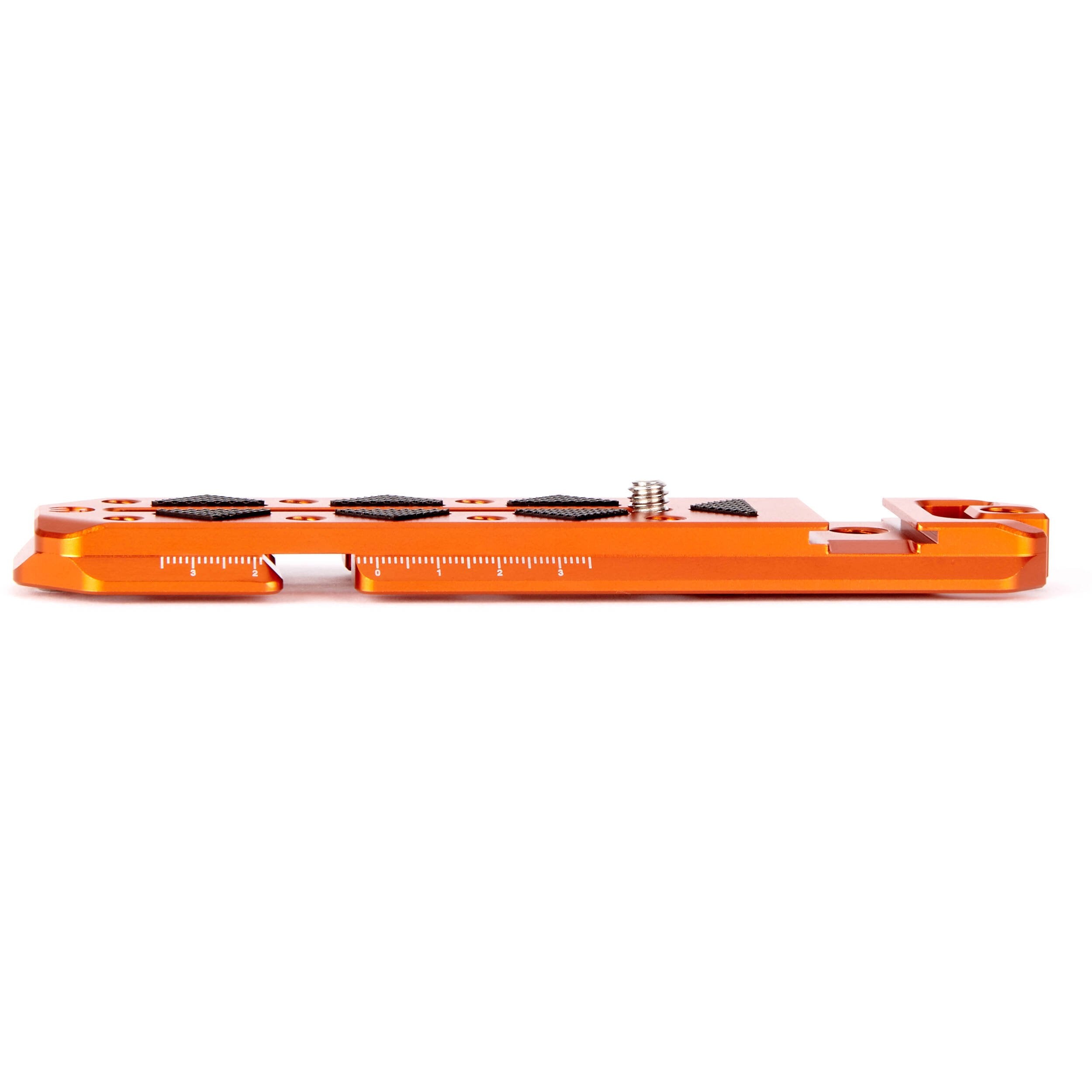 Orange metal plate with multiple components on a white background