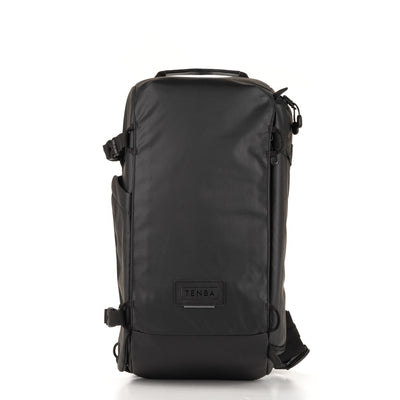 Black backpack with 'Tenba' logo on a white background