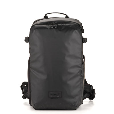 Black backpack with visible brand logo on a white background