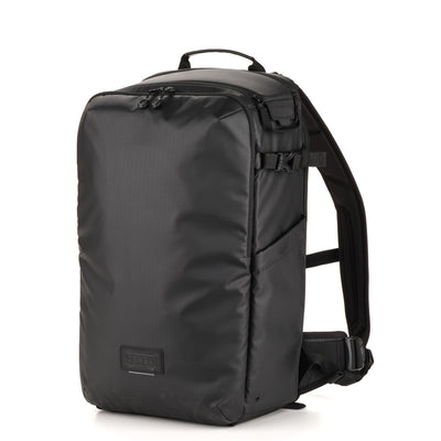 Black backpack on a white background
