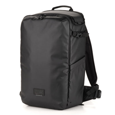 Black backpack on a white background
