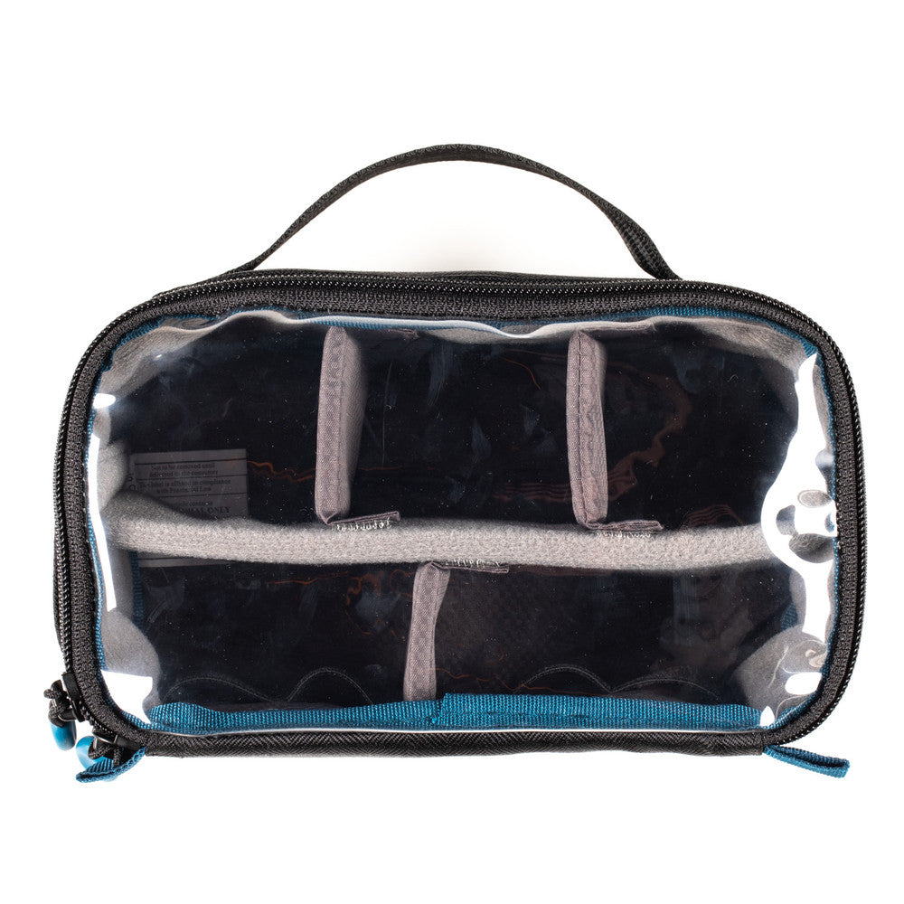 Clear travel pouch with black interior and blue exterior on a white background