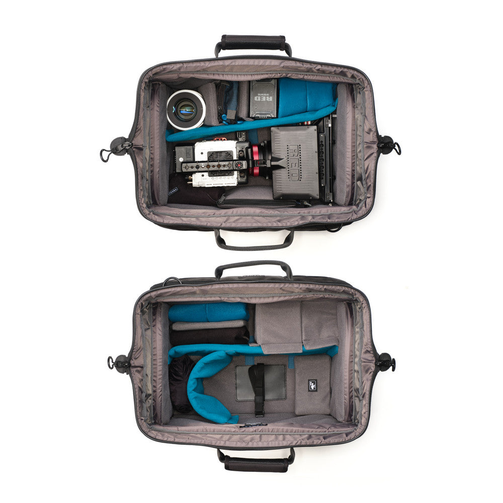 Two open gray travel bags with camera equipment inside on a white background