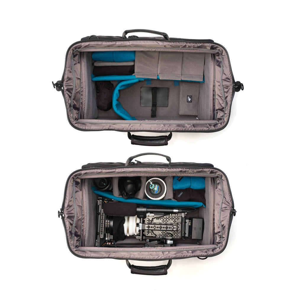 Gray travel bag with camera equipment on a white background