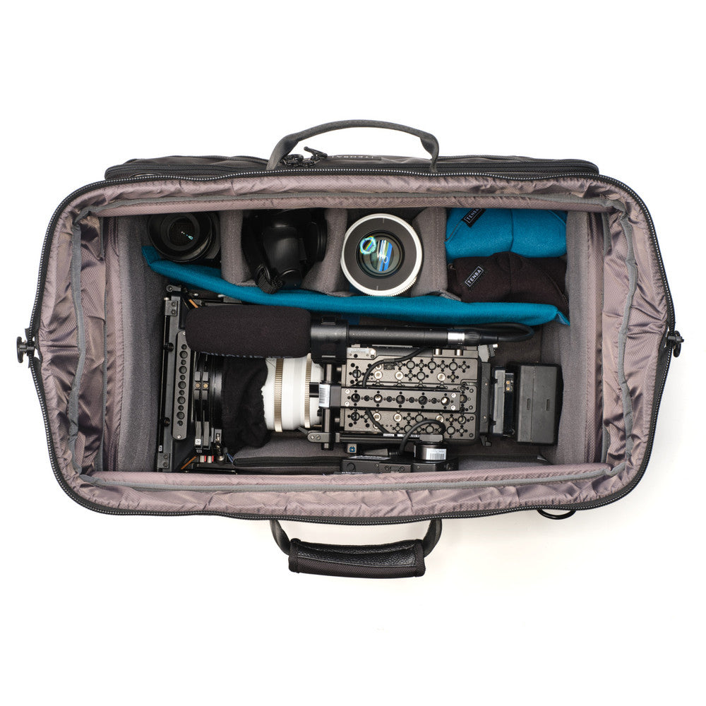 Camera equipment inside a gray carrying case on a white background