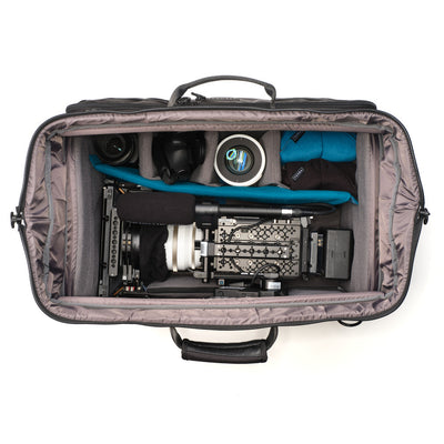 Camera equipment inside a gray carrying case on a white background
