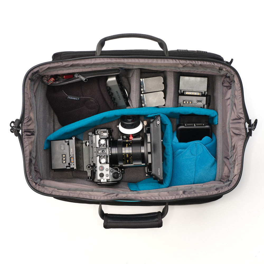 Camera equipment inside a gray bag with blue accents on a white background