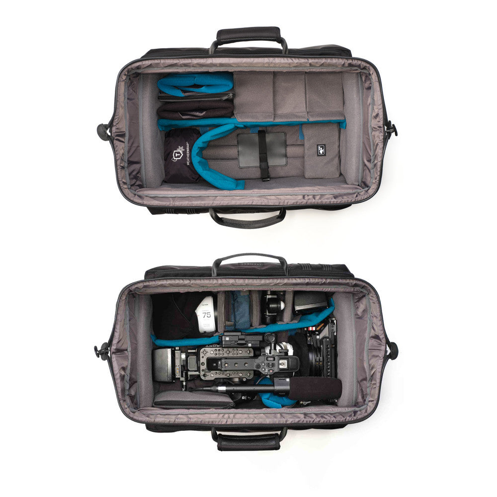 Gray travel bag with camera equipment on a white background