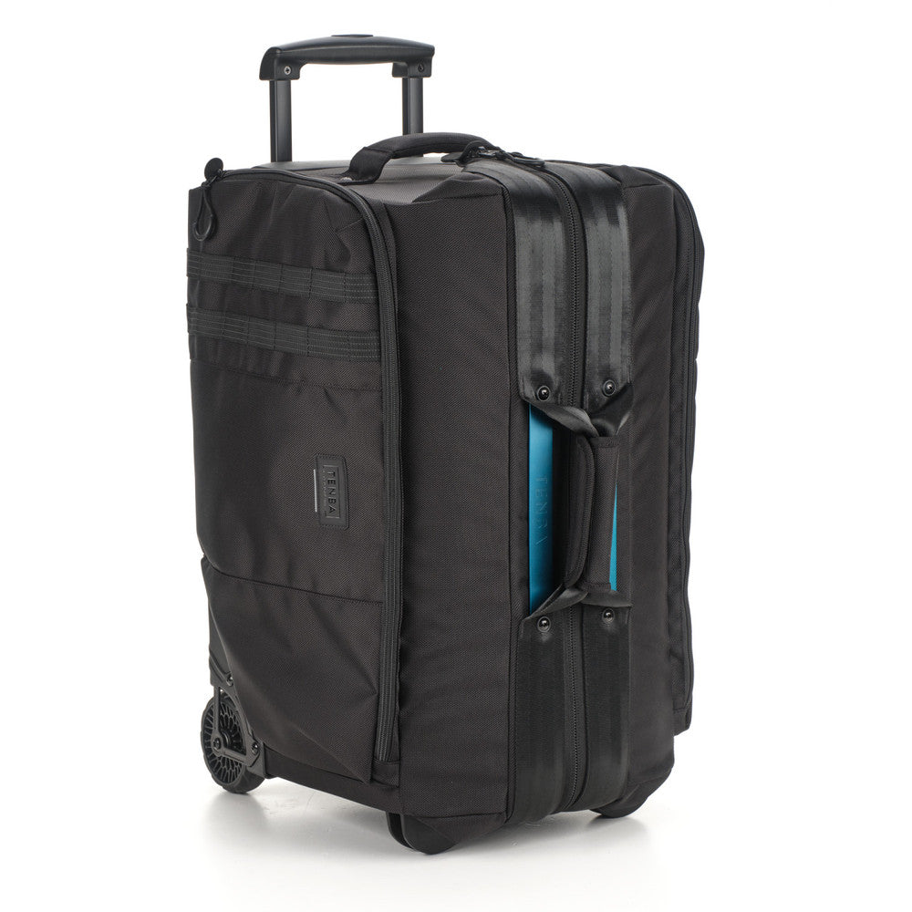 Black rolling suitcase with blue interior on a white background