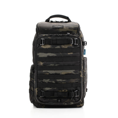 Camouflage backpack with visible brand logo on a white background