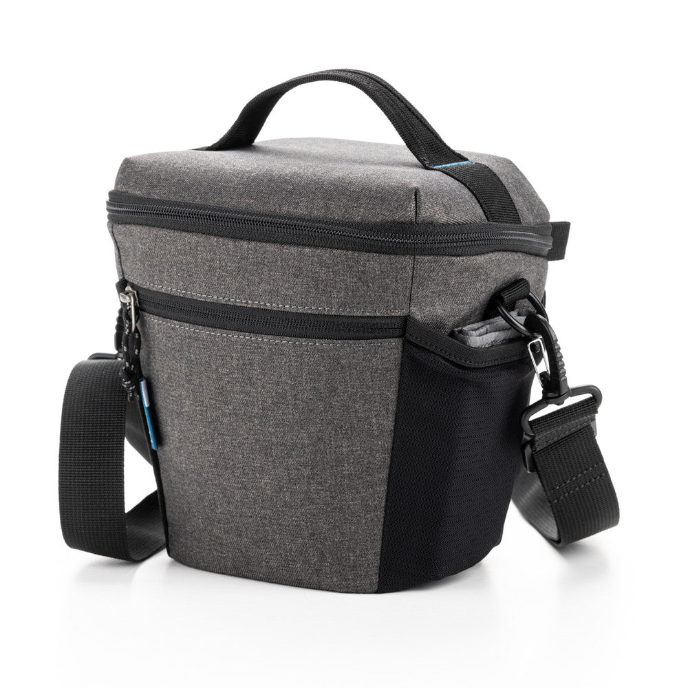 Gray and black camera bag with a shoulder strap on a white background