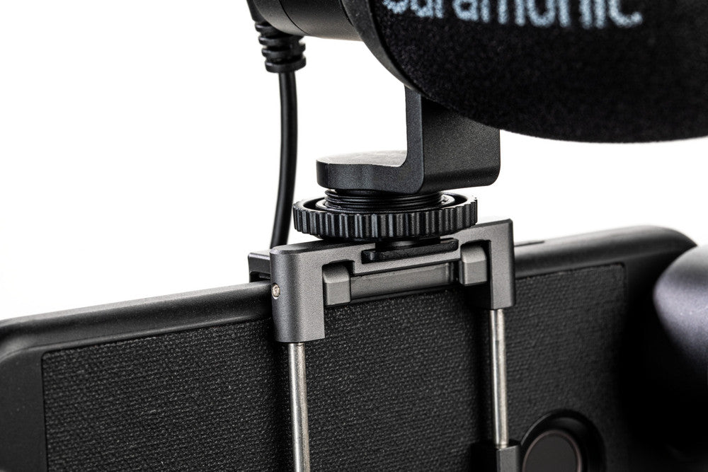 Microphone with a stand and 'Saramonic' branding on a white background