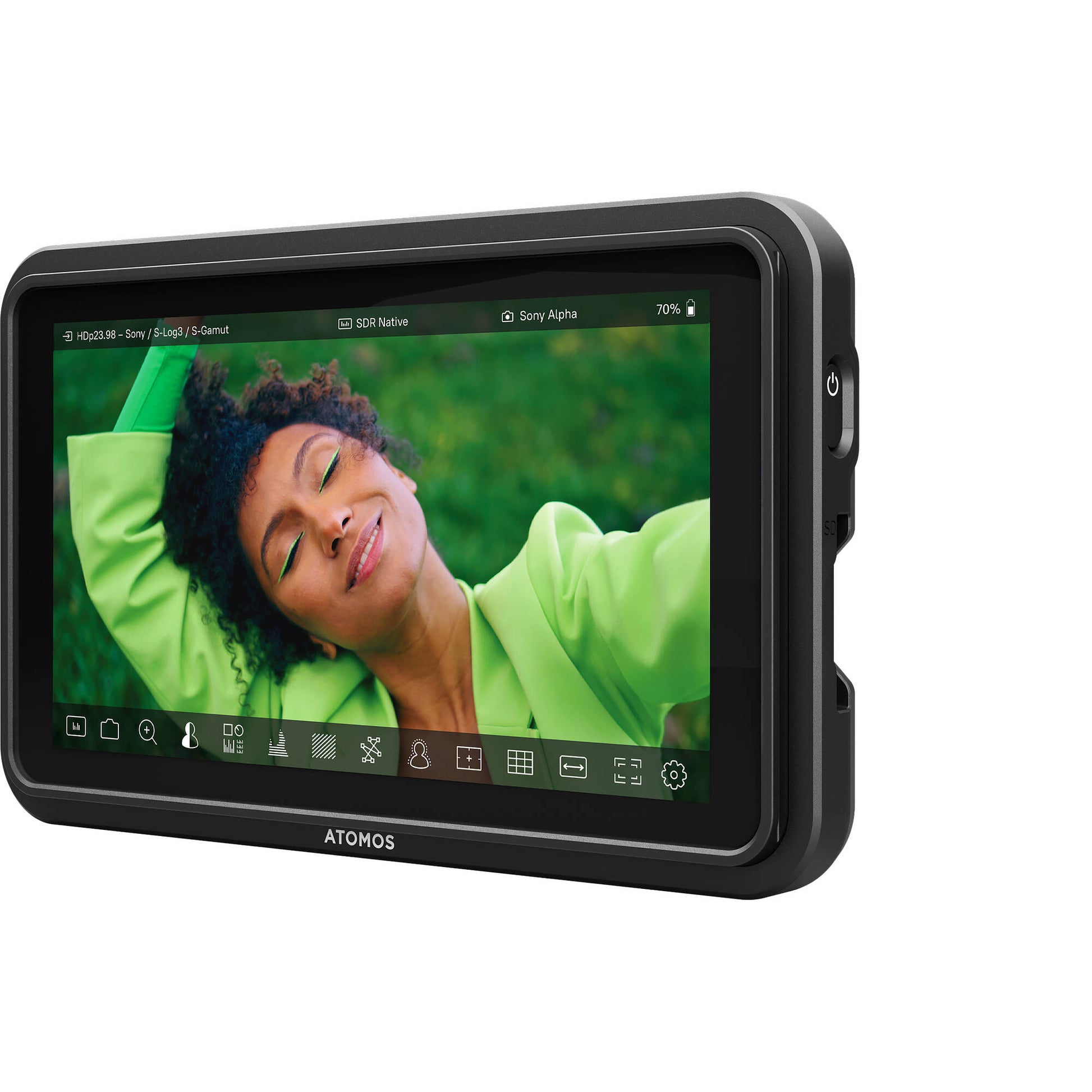 Display device with a person in a green shirt on the screen, branded 'ATOMOS'.