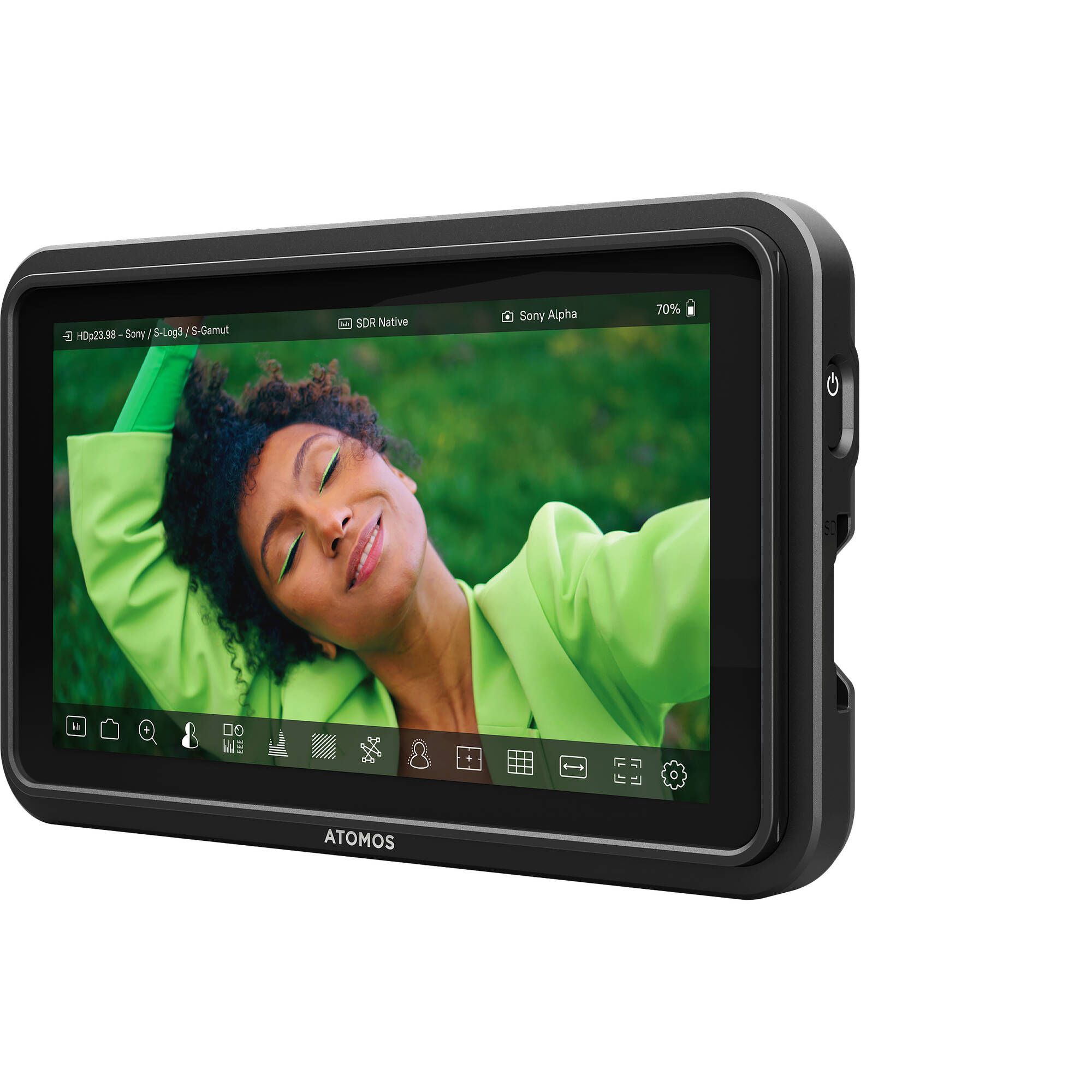 Display device with a person in a green shirt on the screen, branded 'ATOMOS'.