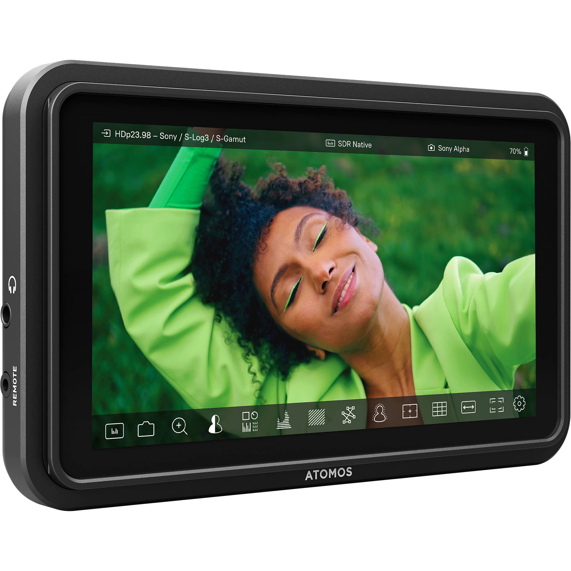 ATOMOS display device showing a person in a green shirt with a blurred background