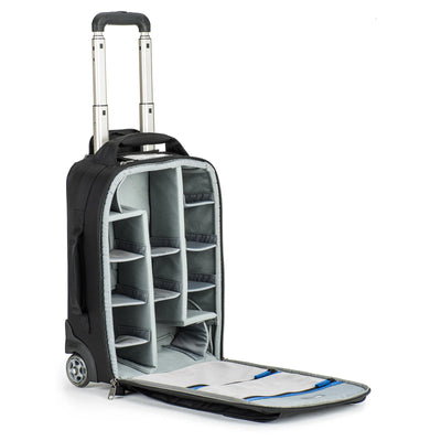 Think Tank Airport Advantage — compact rolling camera bag with customizable dividers, dedicated 15” laptop compartment, tripod mount, and water bottle pocket.