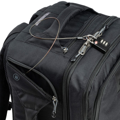 Think Tank Airport Commuter camera backpack — black carry-on bag with padded camera compartment, laptop sleeve, and side tripod straps.