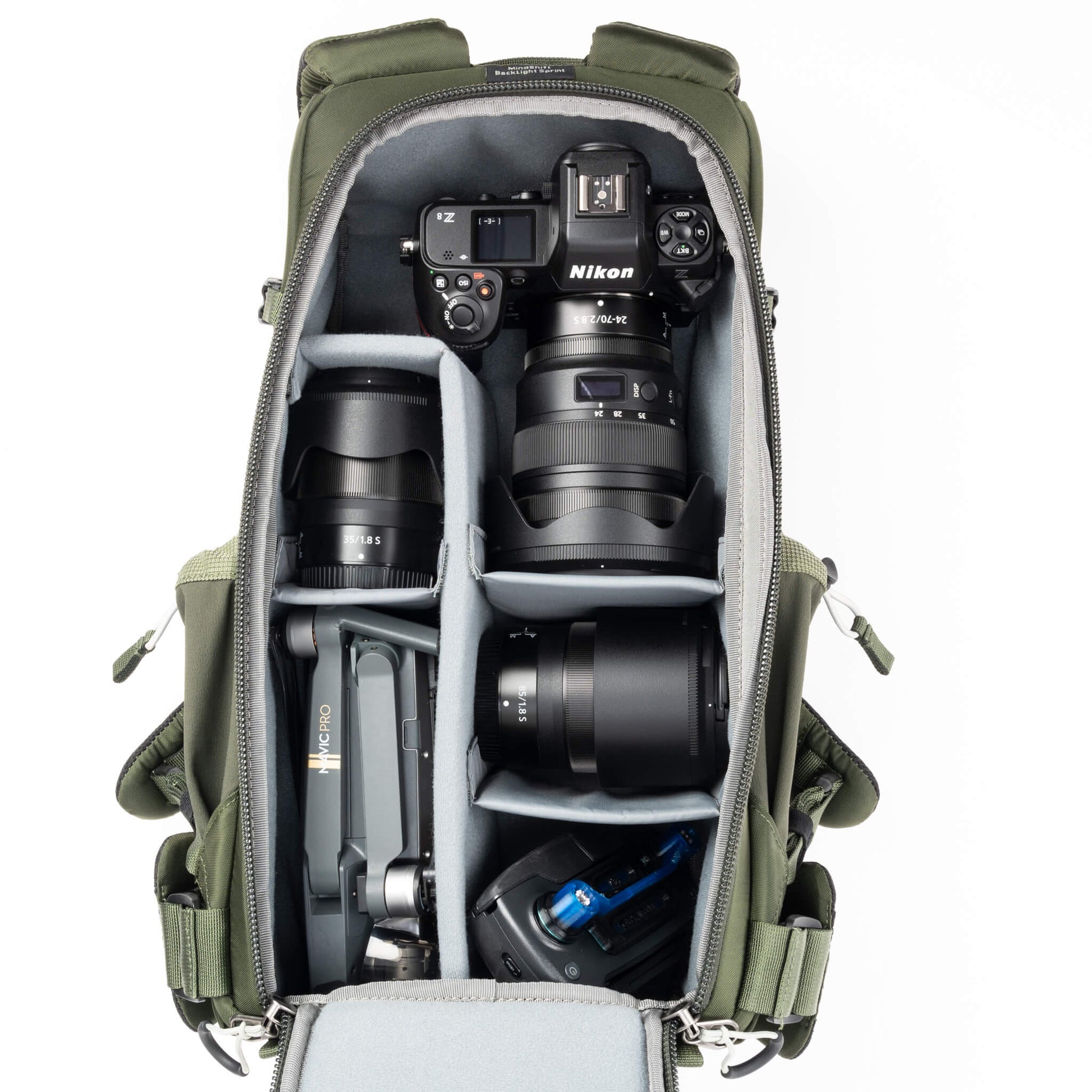 The MindShift Gear BackLight Spring Backpack is a spacious, weather-resistant camera backpack designed for convenient, spring-loaded access to photography gear.