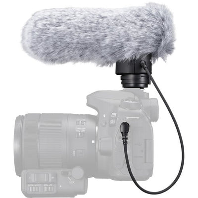 Camera with a microphone attached on a white background