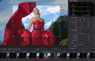 A screenshot of a photo editing software interface showing a portrait of a woman in a flowing red dress with a large red fabric selection mask and adjustment sliders on the right.