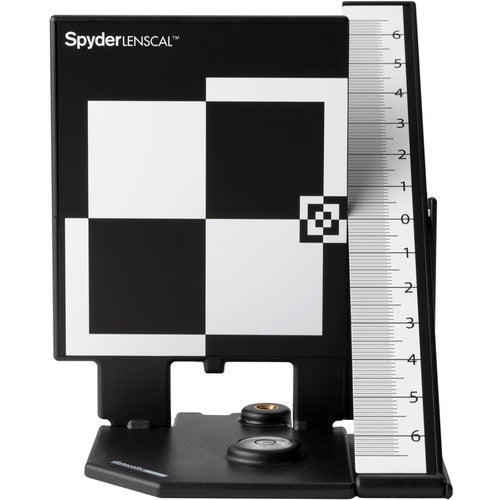 Spyder LENSCAL color calibration device with checkered pattern and ruler on a white background