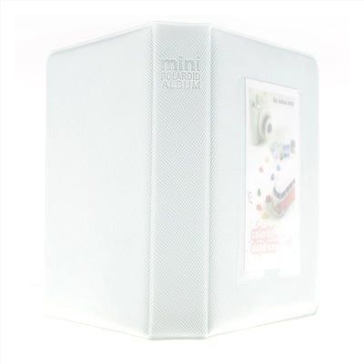 White Polaroid photo album with colorful design on a white background