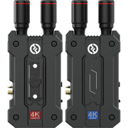 Two black wireless transmitter and receiver sets with visible branding on a white background