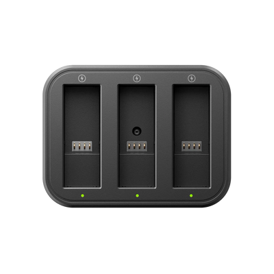 Black triple battery charger with three slots on a white background