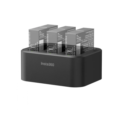 Black charging station with Insta360 branding holding multiple charging blocks.