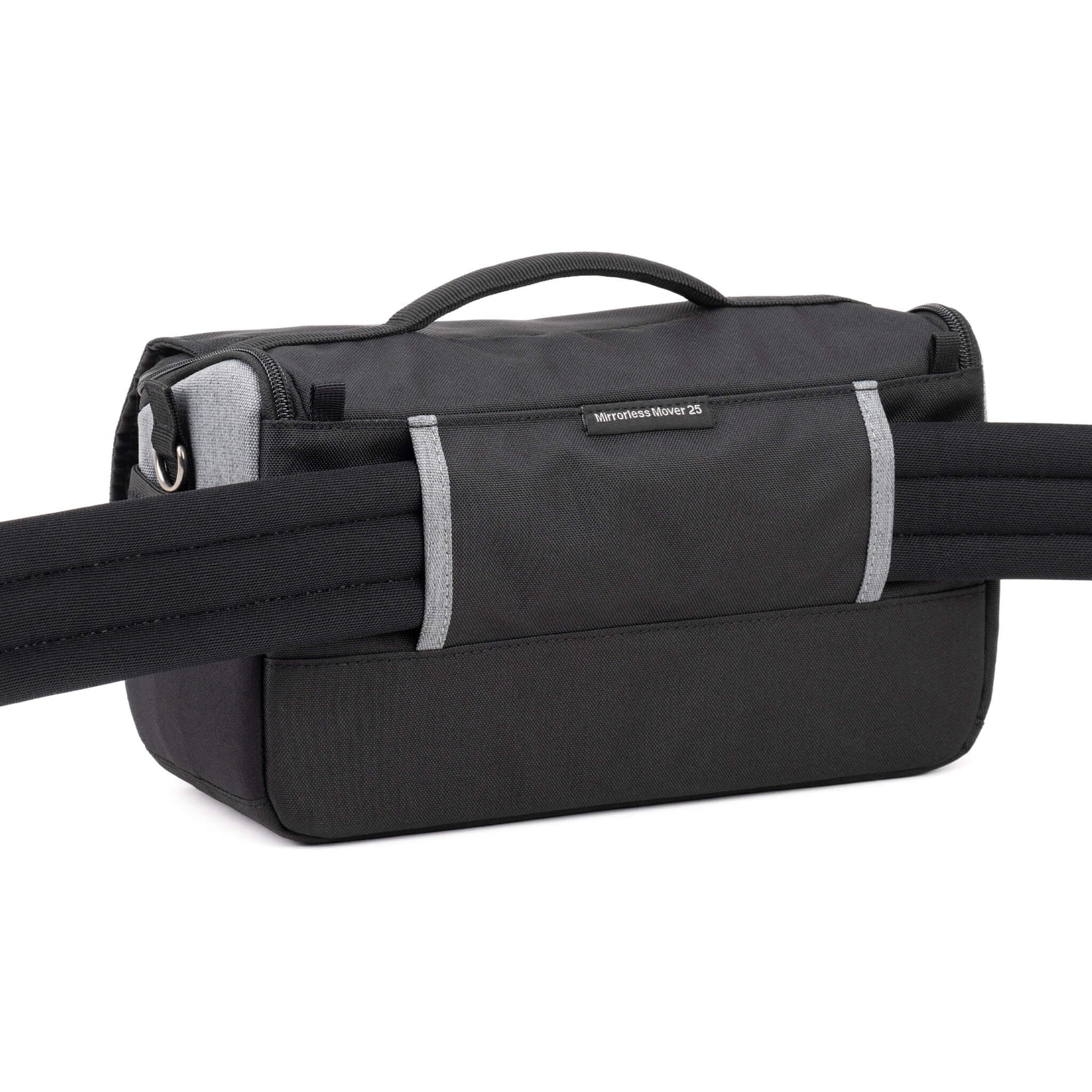 Think Tank Photo Mirrorless Mover 25 camera shoulder bag, black, compact with flip-top lid, multiple pockets, padded interior for mirrorless camera and lenses, rain cover included