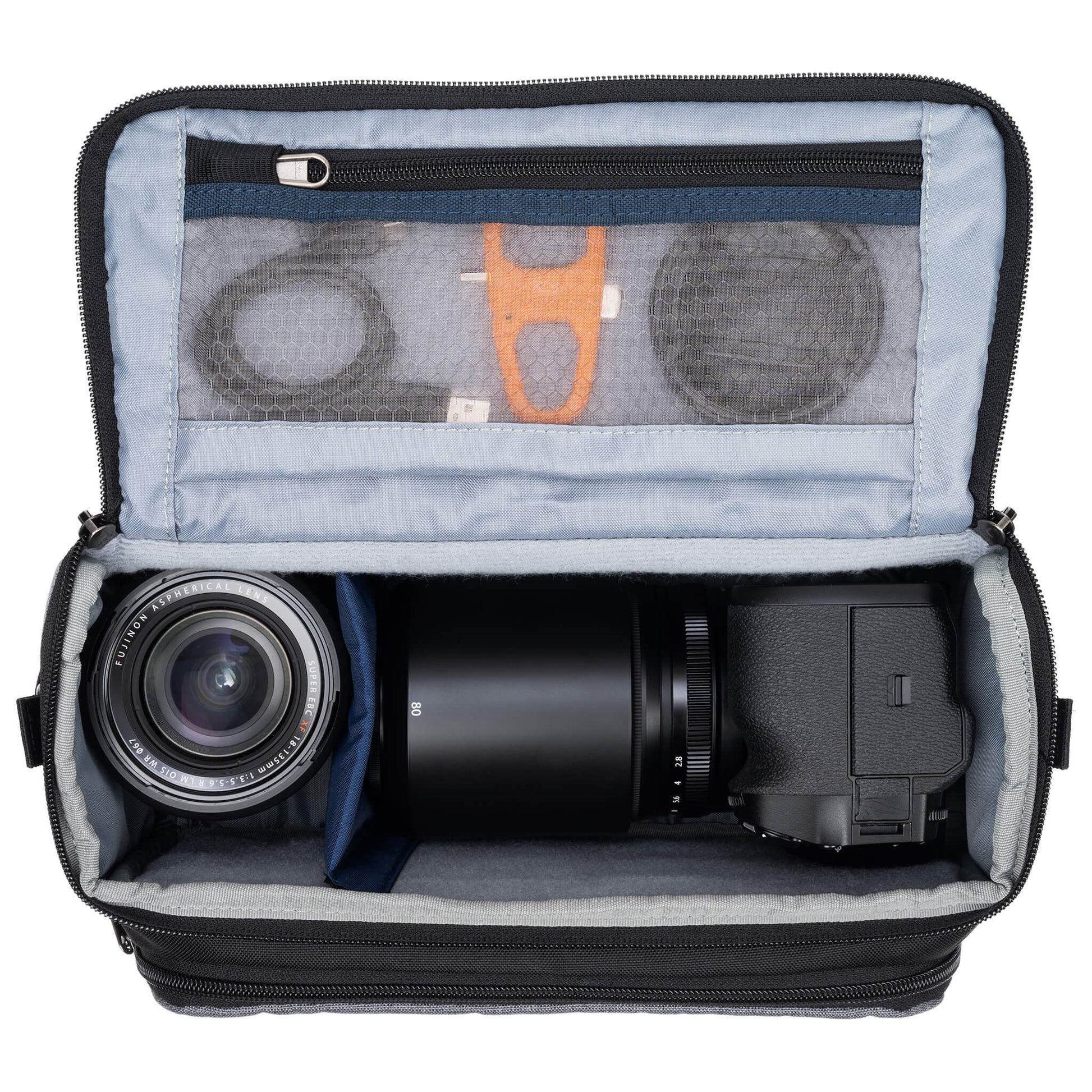 Think Tank Photo Mirrorless Mover 25 camera shoulder bag, black, compact with flip-top lid, multiple pockets, padded interior for mirrorless camera and lenses, rain cover included