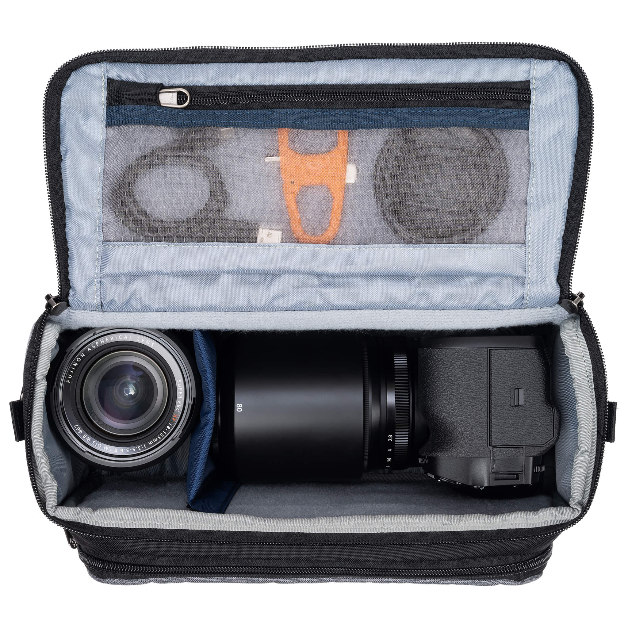 Think Tank Photo Mirrorless Mover 25 camera shoulder bag, black, compact with flip-top lid, multiple pockets, padded interior for mirrorless camera and lenses, rain cover included