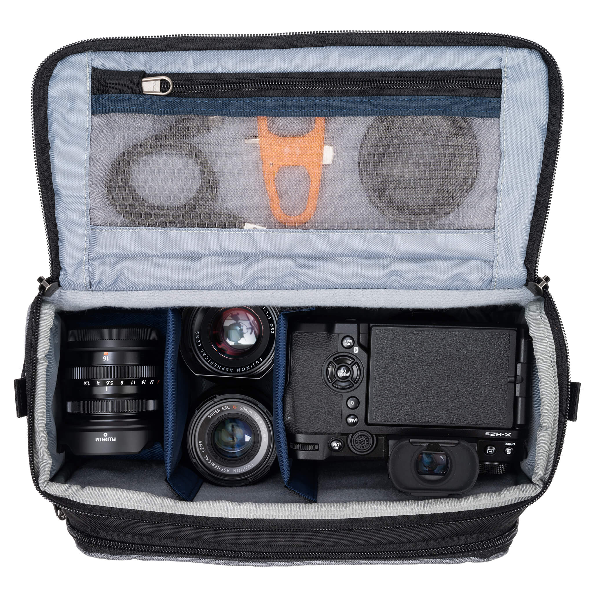Think Tank Photo Mirrorless Mover 25 camera shoulder bag, black, compact with flip-top lid, multiple pockets, padded interior for mirrorless camera and lenses, rain cover included
