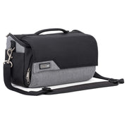 Think Tank Photo Mirrorless Mover 25 camera shoulder bag, black, compact with flip-top lid, multiple pockets, padded interior for mirrorless camera and lenses, rain cover included