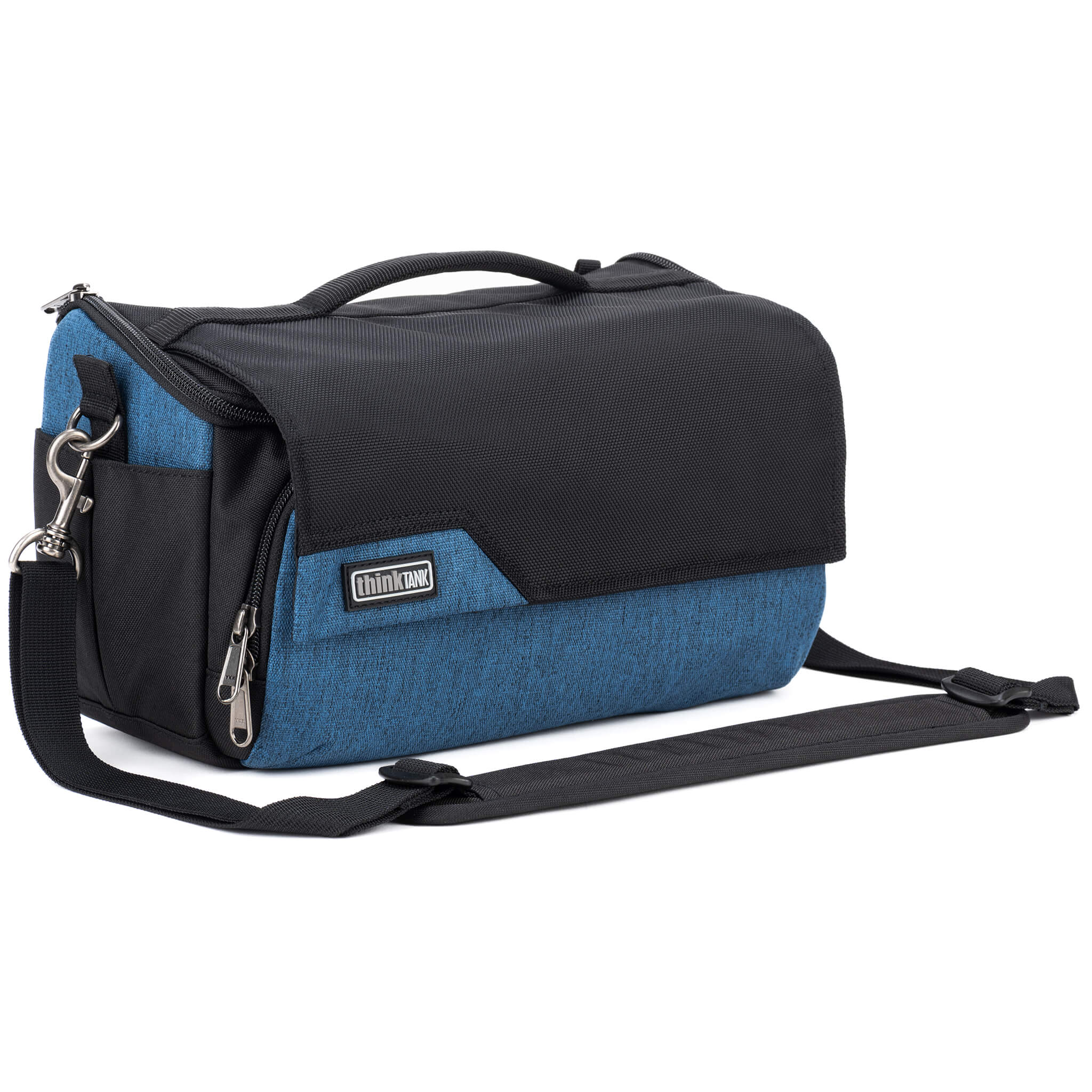 Think Tank Photo Mirrorless Mover 25 camera shoulder bag, black, compact with flip-top lid, multiple pockets, padded interior for mirrorless camera and lenses, rain cover included