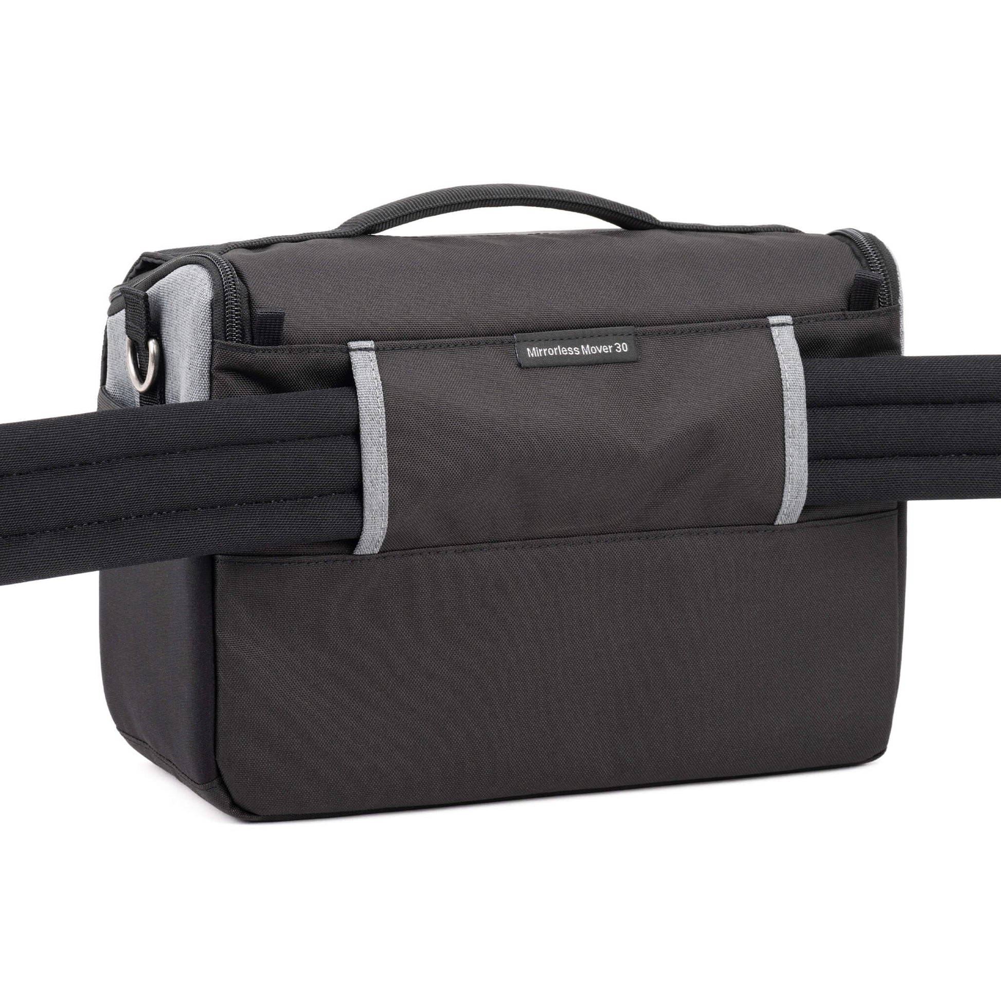 Think Tank Photo Mirrorless Mover 30 camera shoulder bag, flip-top lid with magnetic closure, multiple pockets, padded interior with adjustable dividers for mirrorless camera and lenses, rain cover included
