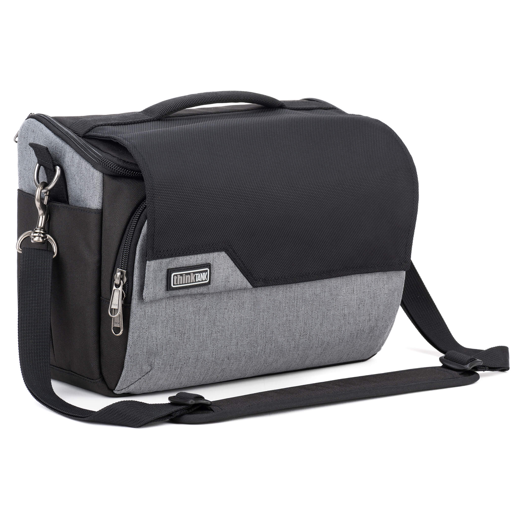 Think Tank Photo Mirrorless Mover 30 camera shoulder bag, flip-top lid with magnetic closure, multiple pockets, padded interior with adjustable dividers for mirrorless camera and lenses, rain cover included