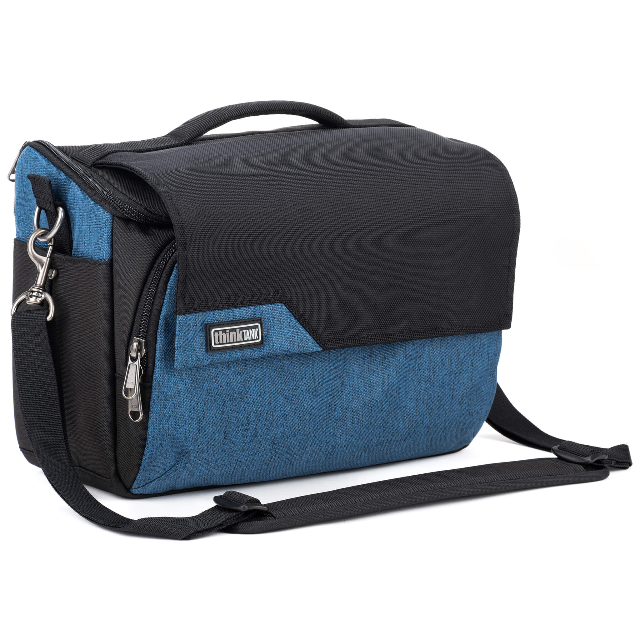 Think Tank Photo Mirrorless Mover 30 camera shoulder bag, flip-top lid with magnetic closure, multiple pockets, padded interior with adjustable dividers for mirrorless camera and lenses, rain cover included